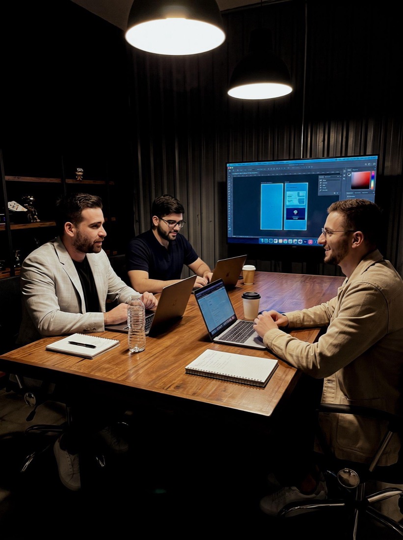 RG Agency team working together in a strategy meeting