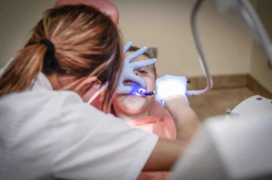 Dentist treating a patient