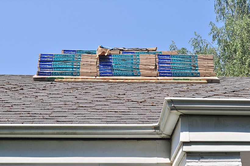 Roofers working on a roof